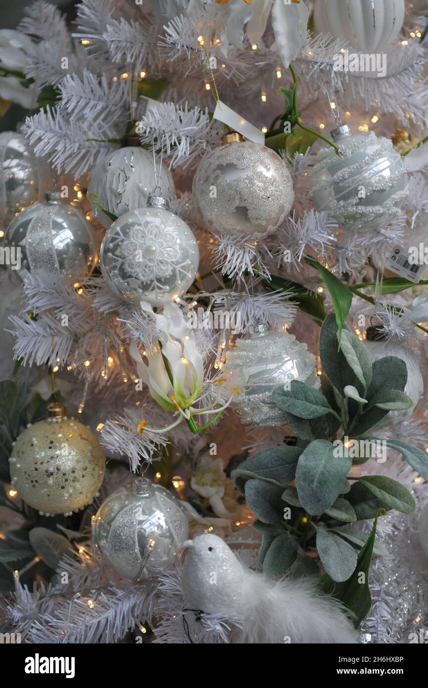 Christmas tree decoration in white colour in interior Stock Photo