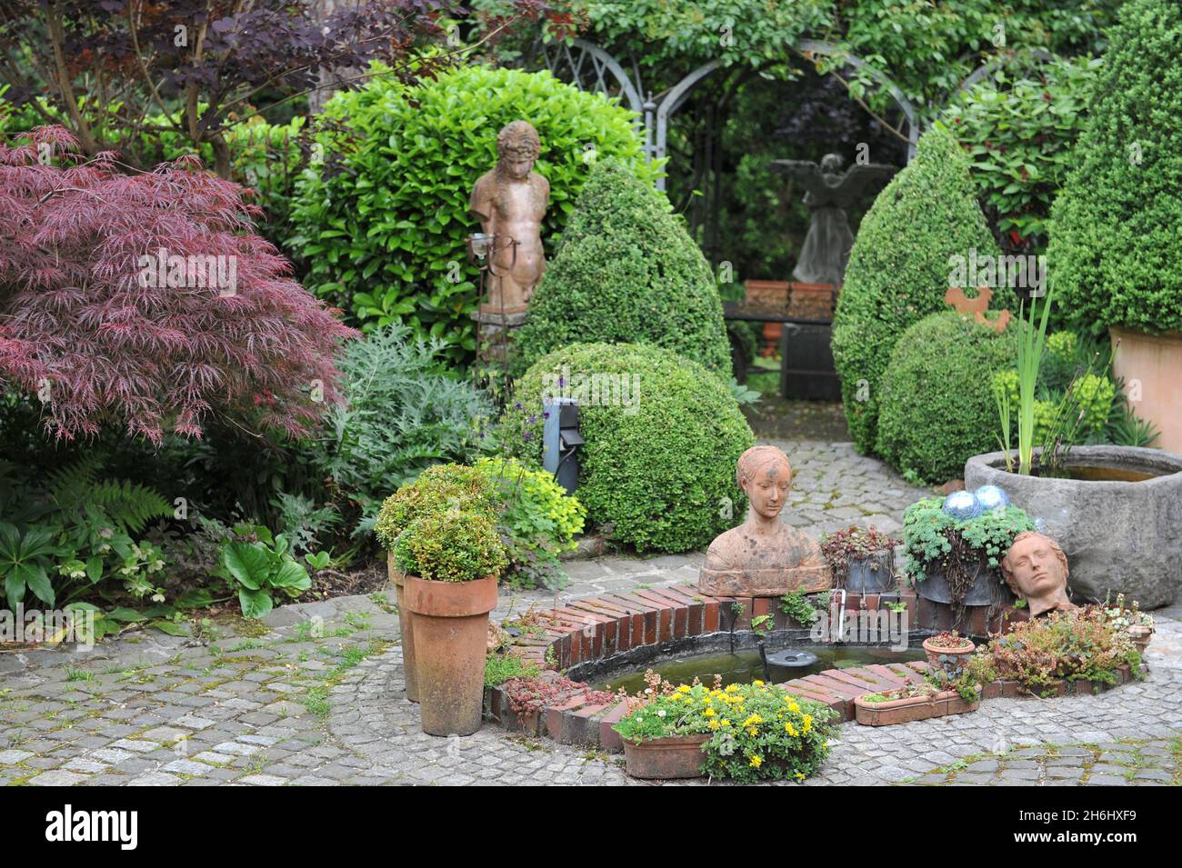 SOLINGEN, GERMANY - 15 JUNE 2013: Decoration of the German garden Ulbrich in June Stock Photo