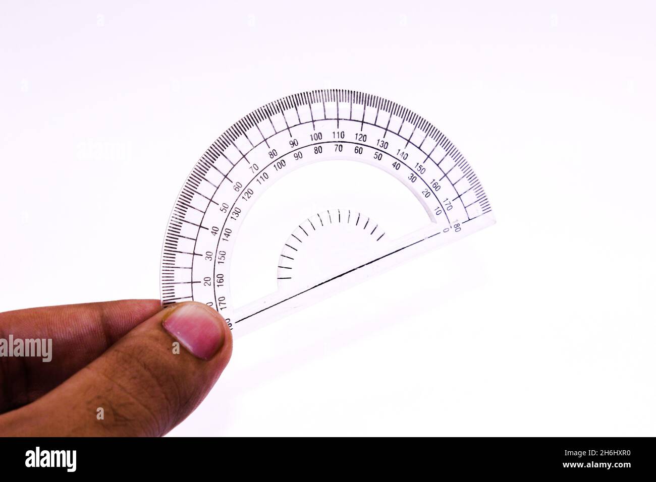 Protecter maths isolated on white background with selective focus Stock ...