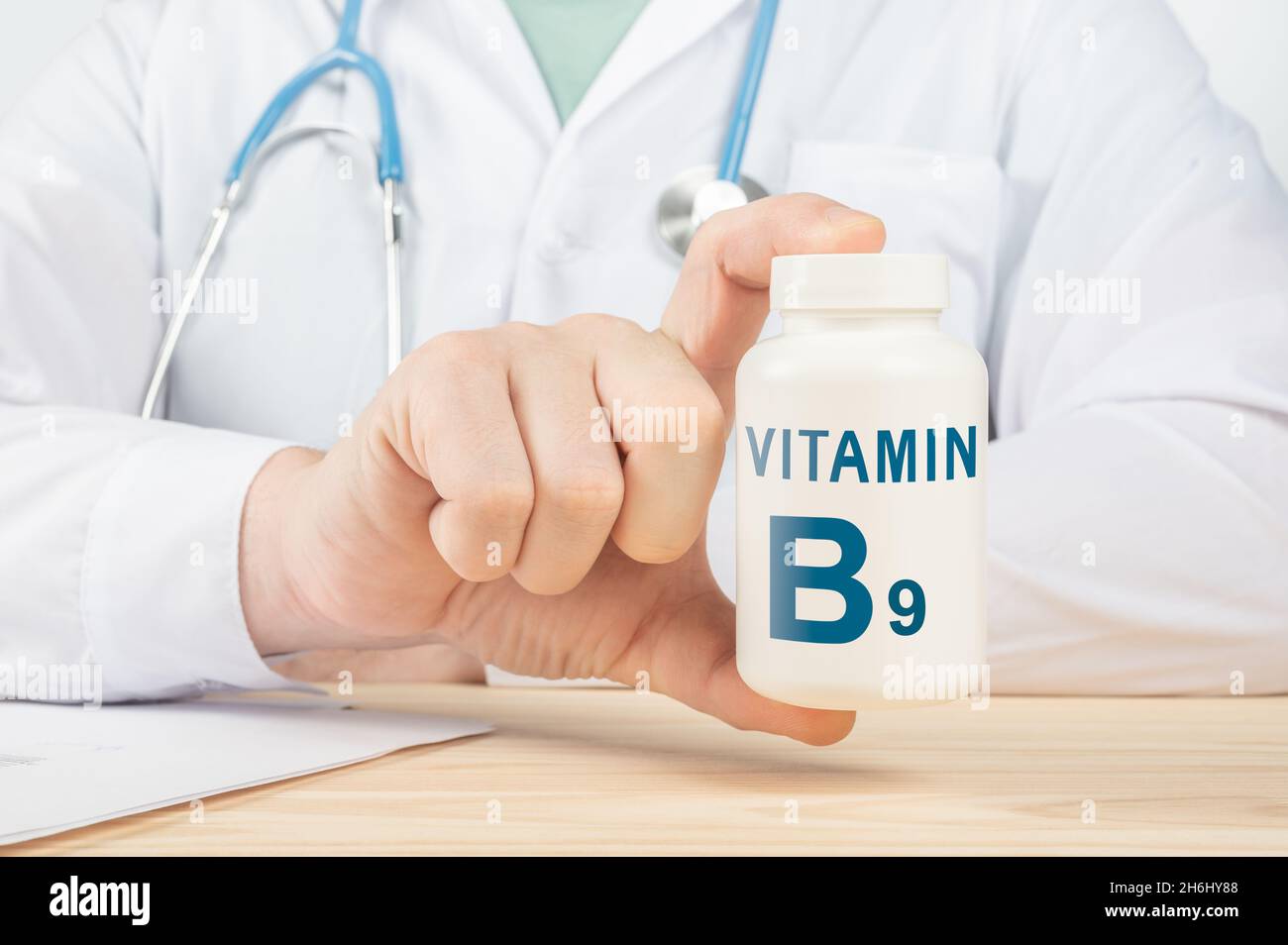 Vitamin B9 and supplements for human health. Doctor taking