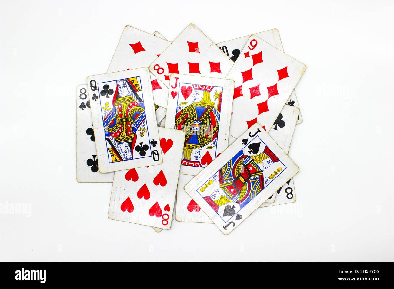 Playing cards on white background with selective focus Stock Photo