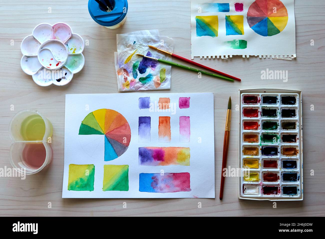 Artist's Workplace. Art Supplies Brushes, Paints, Watercolors. Art Studio. Drawing Lessons. Creative Workshop. Design Place. Watercolor Color Wheel An Stock Photo - Alamy