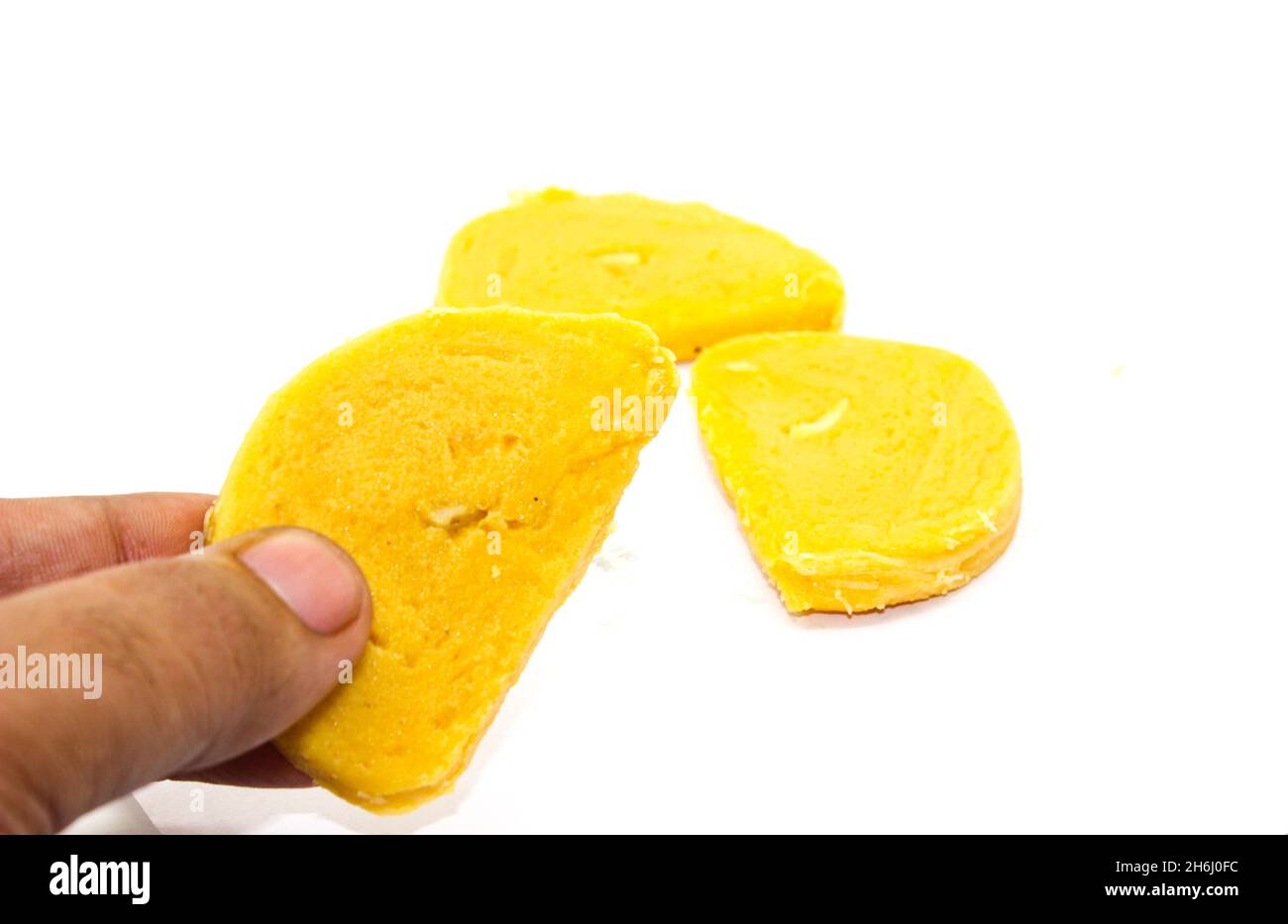 Gram flour sweets on white background with selective focus Stock Photo