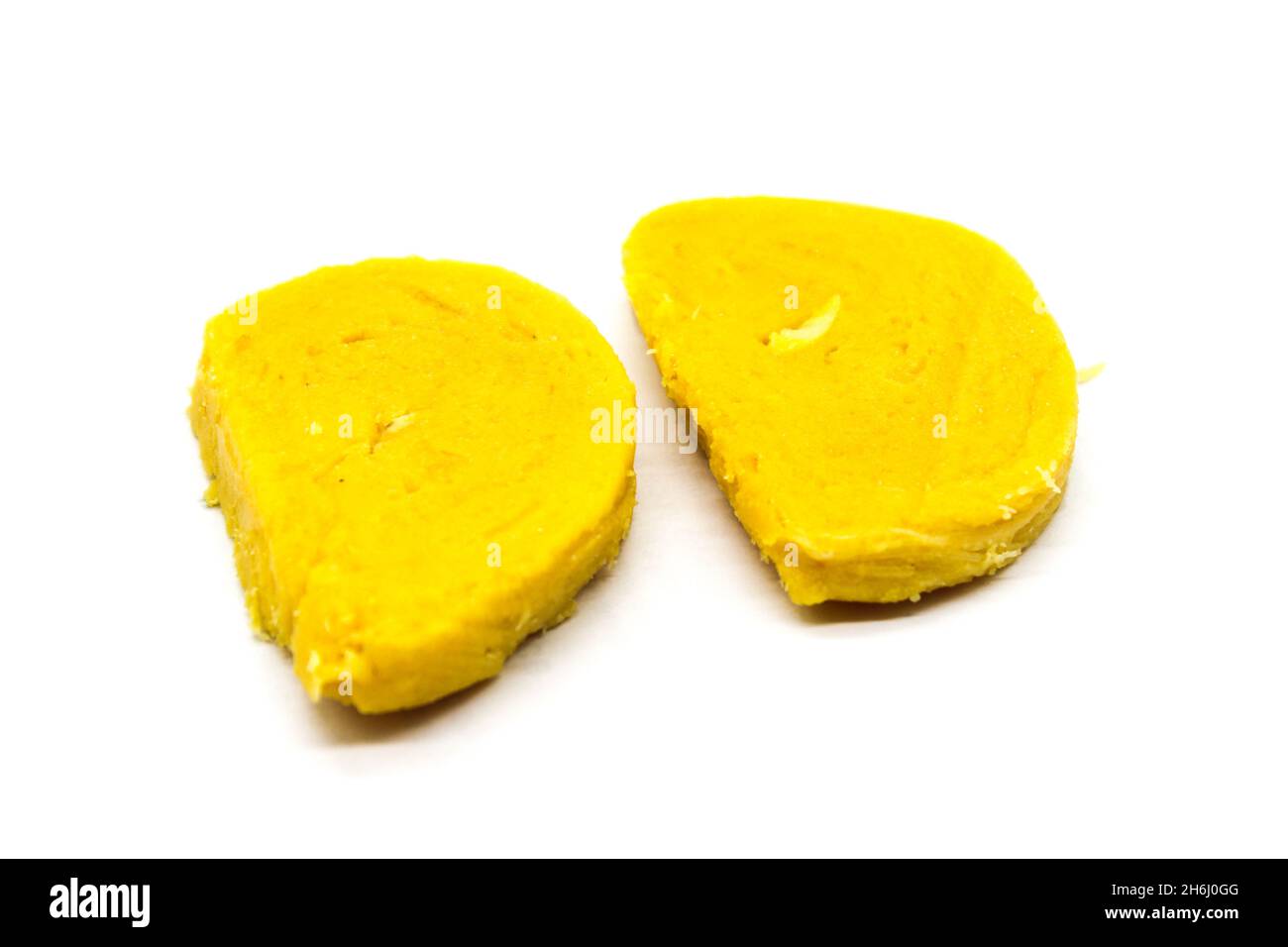 Gram flour sweets on white background with selective focus Stock Photo
