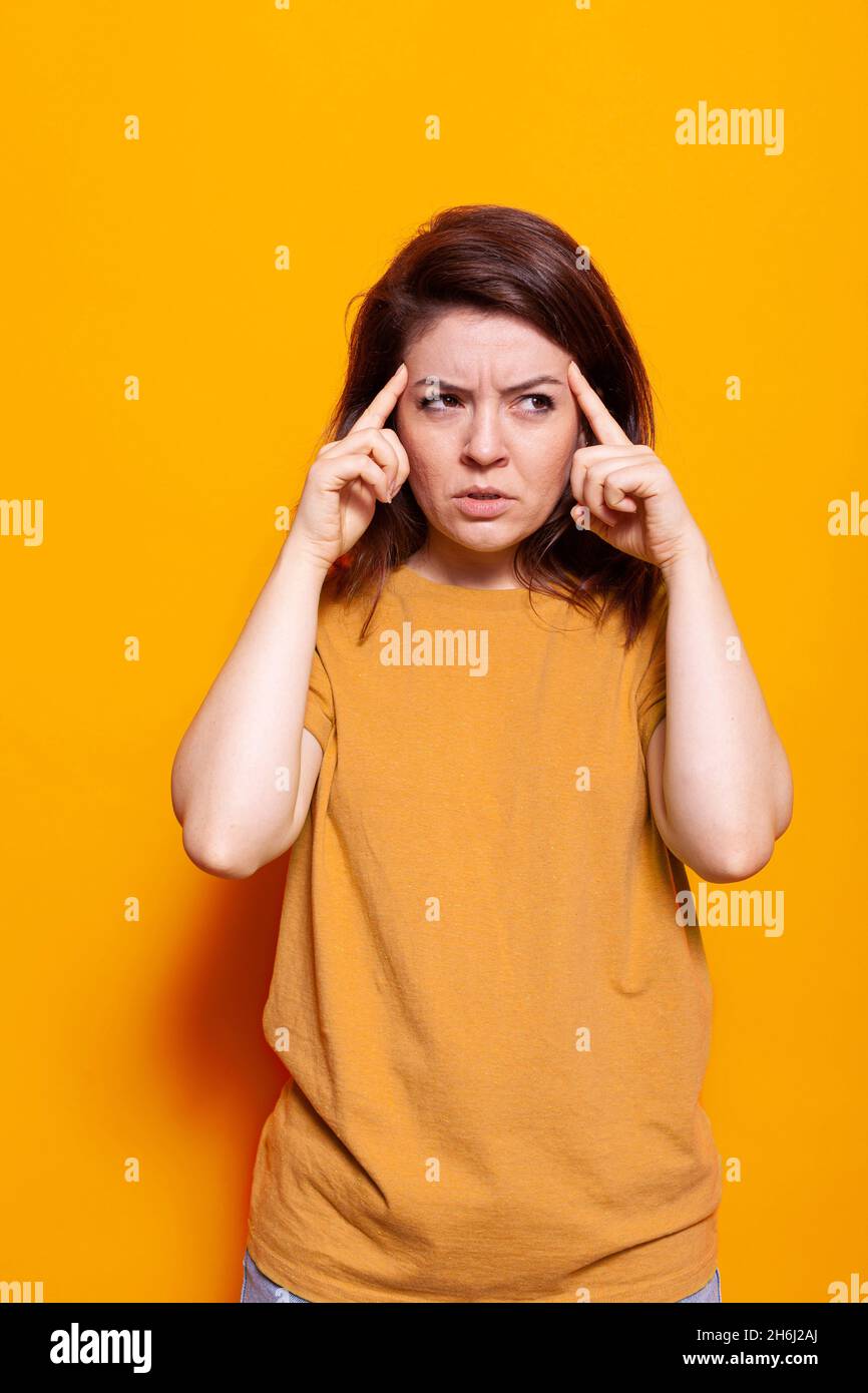 Fingers on temples hi-res stock photography and images - Alamy