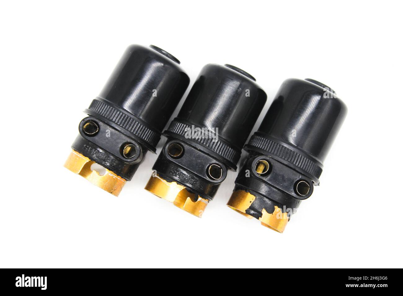 Bulb holders on white background with selective focus Stock Photo