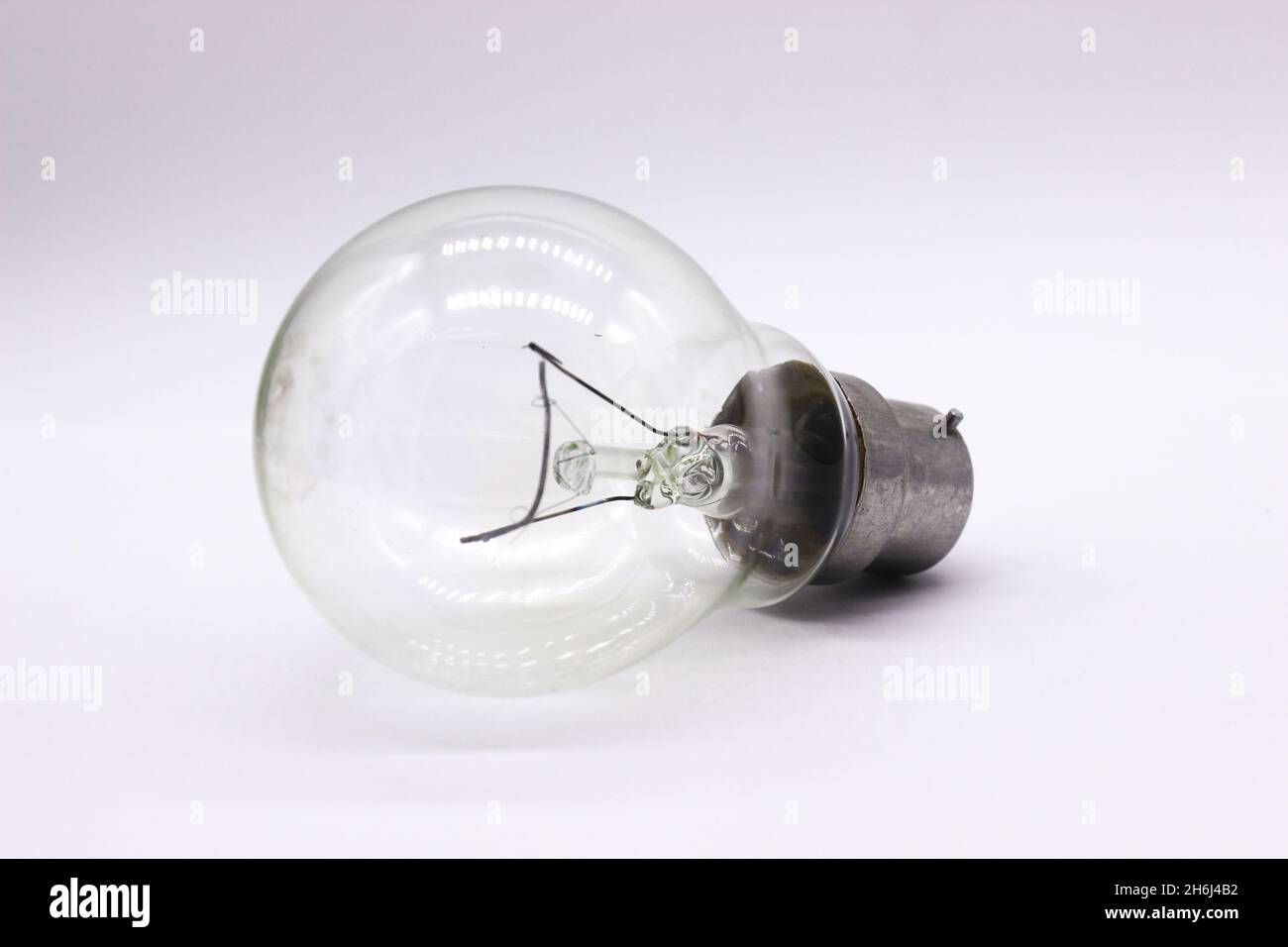 light bulb on white background with selective focus Stock Photo