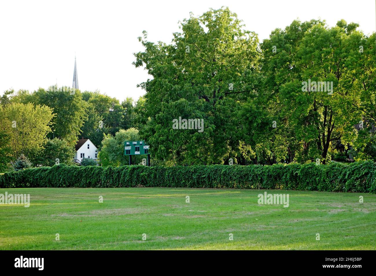 Park with bushes, trees, and manicured lawns in Waverly, Minnesota Stock Photo Alamy
