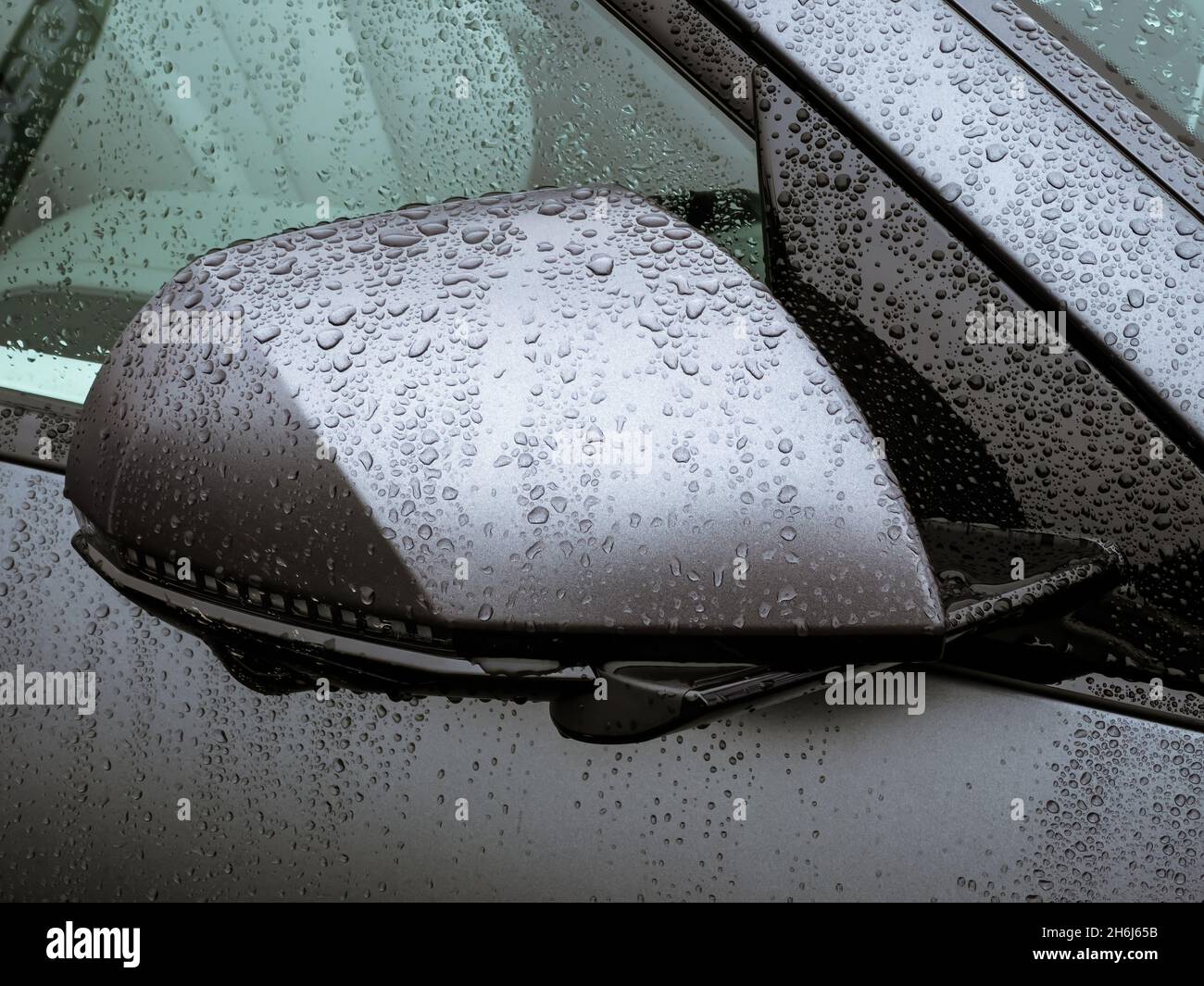 Electric car rear view mirror with hidden CCTV camera guidance Stock