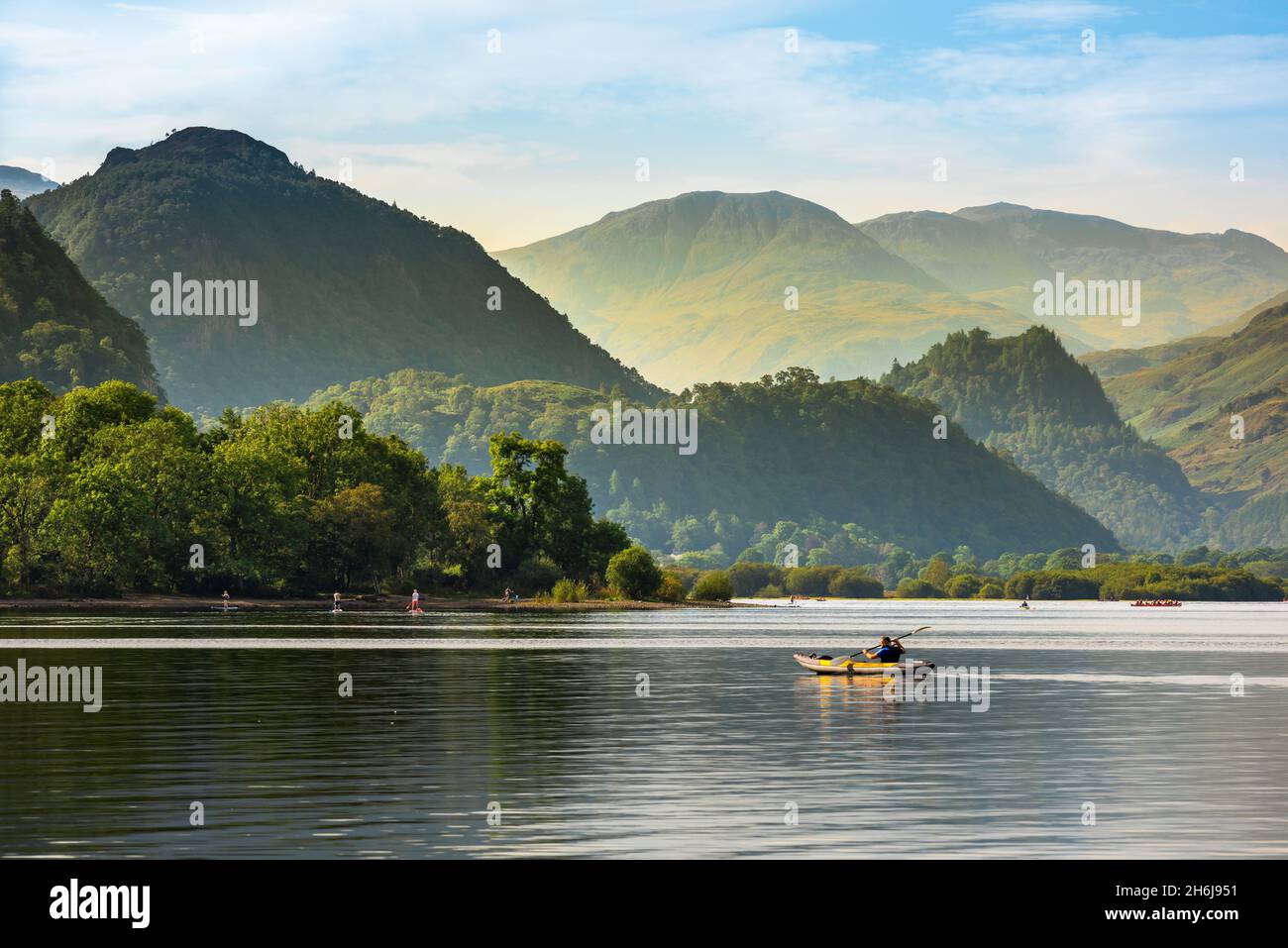 Lake District UK, view on a summer morning of Derwent Water with the high peaks of Borrowdale visible to the south of the lake, Cumbria, England, UK Stock Photo