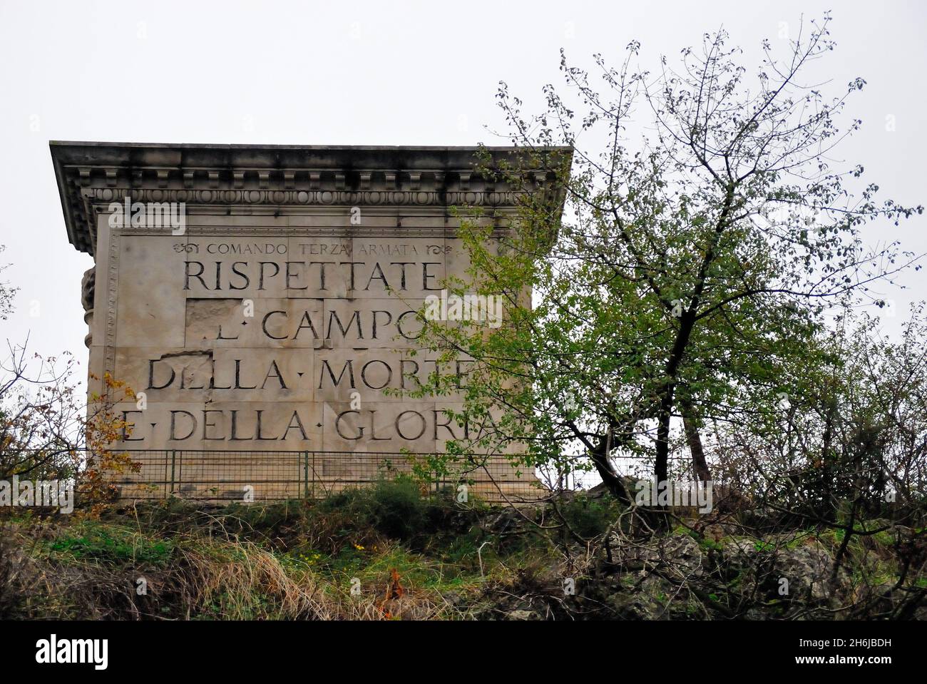 WWI. San Giovanni di Duino, Friuli Venezia Giulia, Italy. WWI : Memorial monument of the Terza Armata (Third Army). The inscription reads: 'Rispettate il campo della morte e della gloria'  (Respect the field of death and glory) Stock Photo