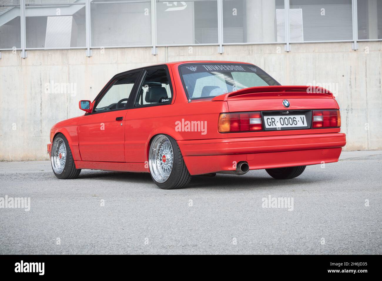 MONTMELO; SPAIN-OCTOBER 9; 2021: BMW 3 Series (E30) two-door sedan (Red second generation of BMW 3 Series) Stock Photo
