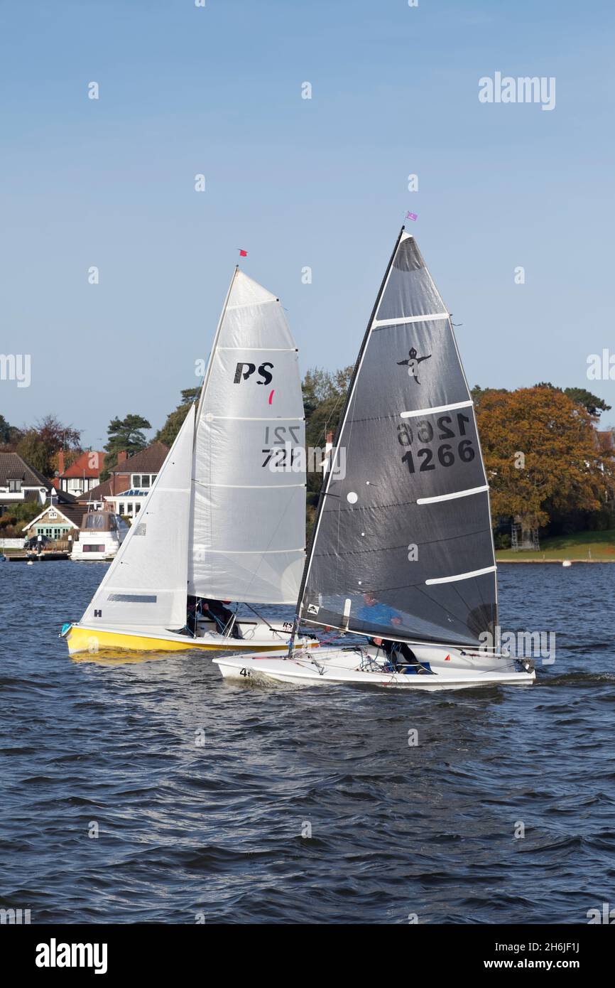 Two sailing dinghy's close together on Alton Broad, Norfolk, England