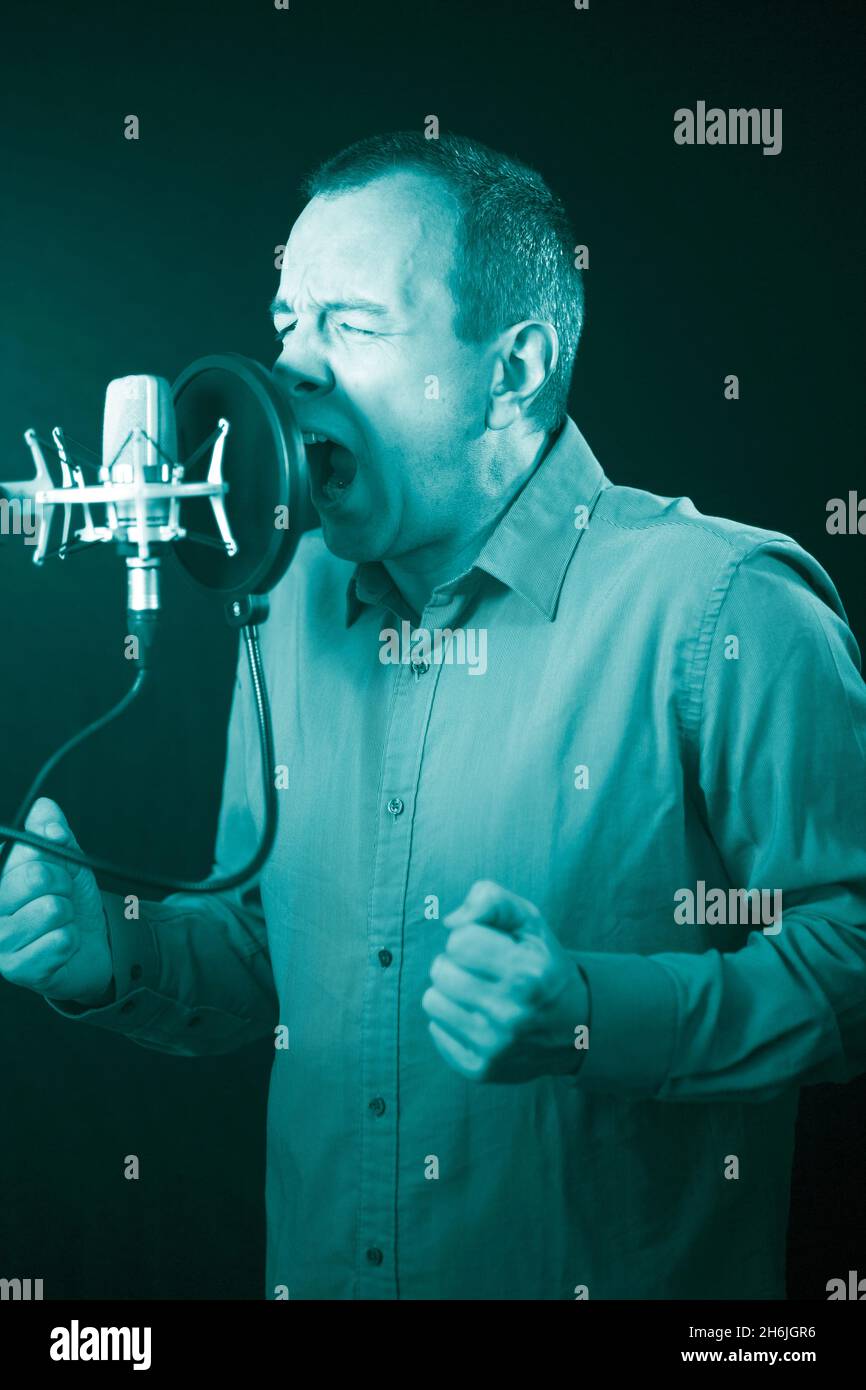 Voice over artist in booth hires stock photography and images Alamy