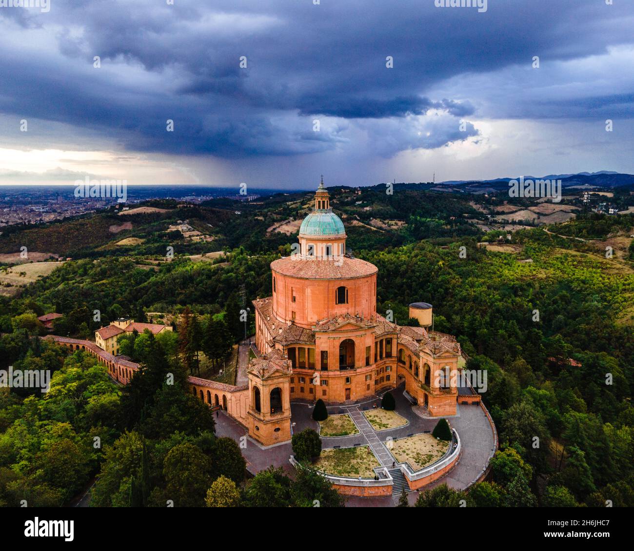 Sanctuary of Madonna di St. Luca, the symbol of Bologna, at sunset during a storm, Bologna, Emilia Romagna, Italy, Europe Stock Photo
