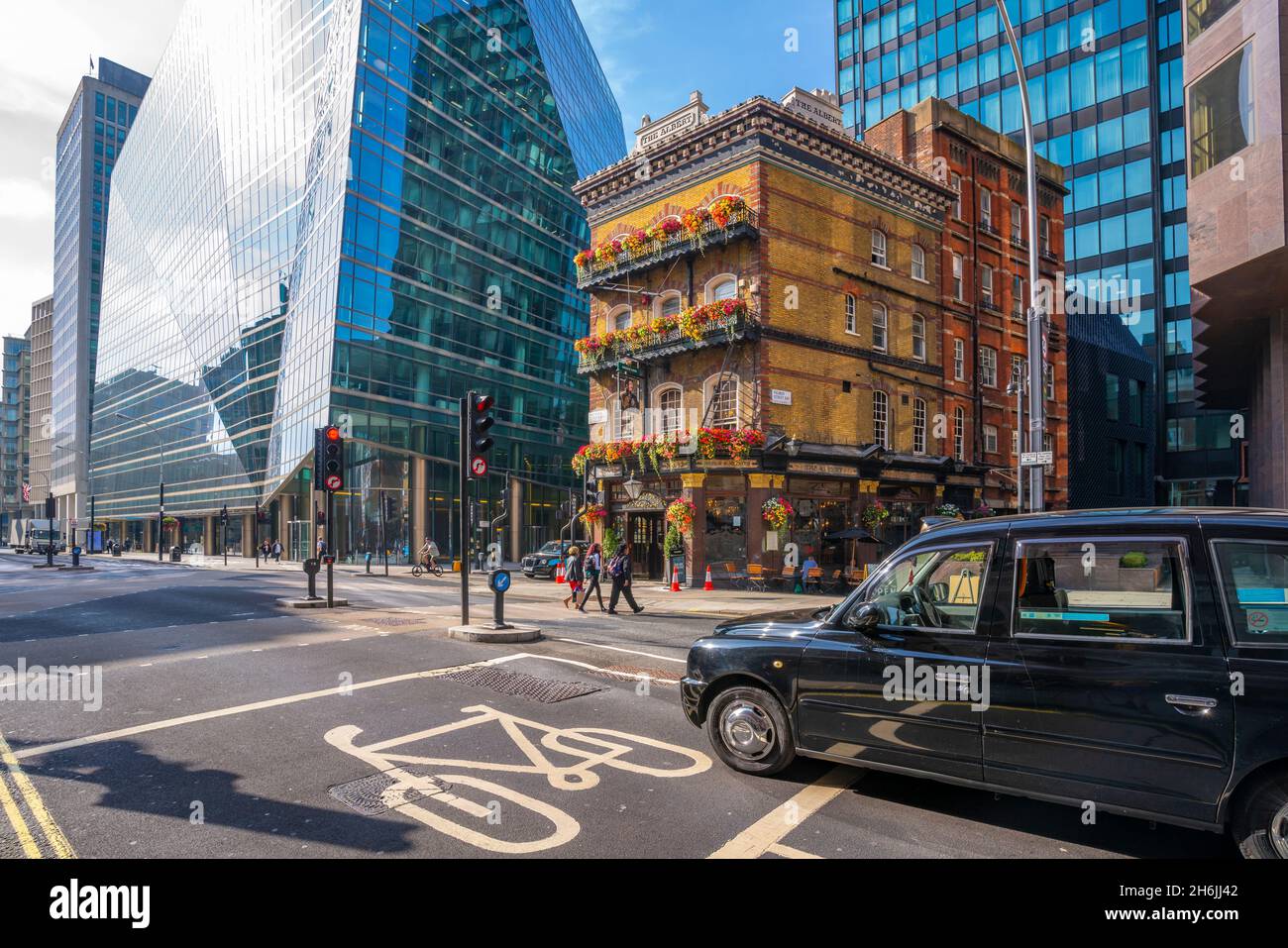 View of The Albert, an old London pub, in Victoria Street surrounded by modern buildings, Westminster, London, England, United Kingdom, Europe Stock Photo