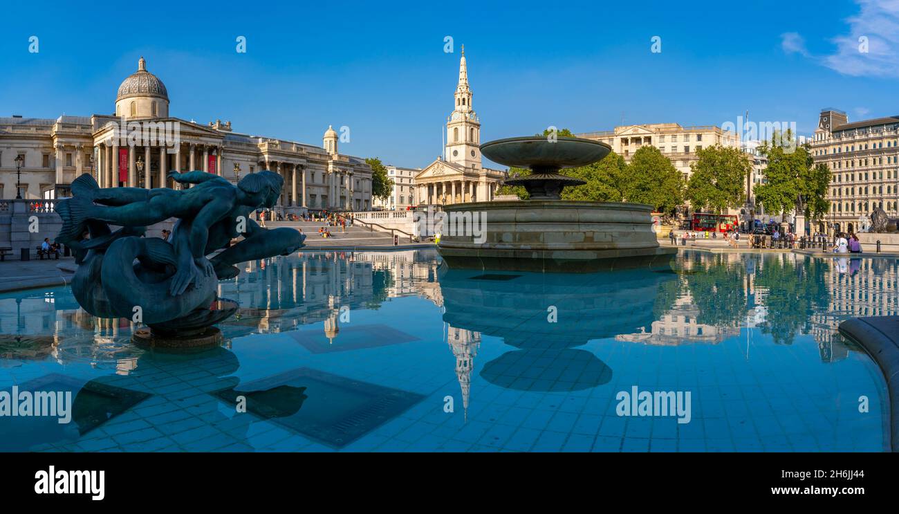 View of The National Gallery, St. Martins-in-the-Fields church and fountains in Trafalgar Square, Westminster, London, England, United Kingdom, Europe Stock Photo