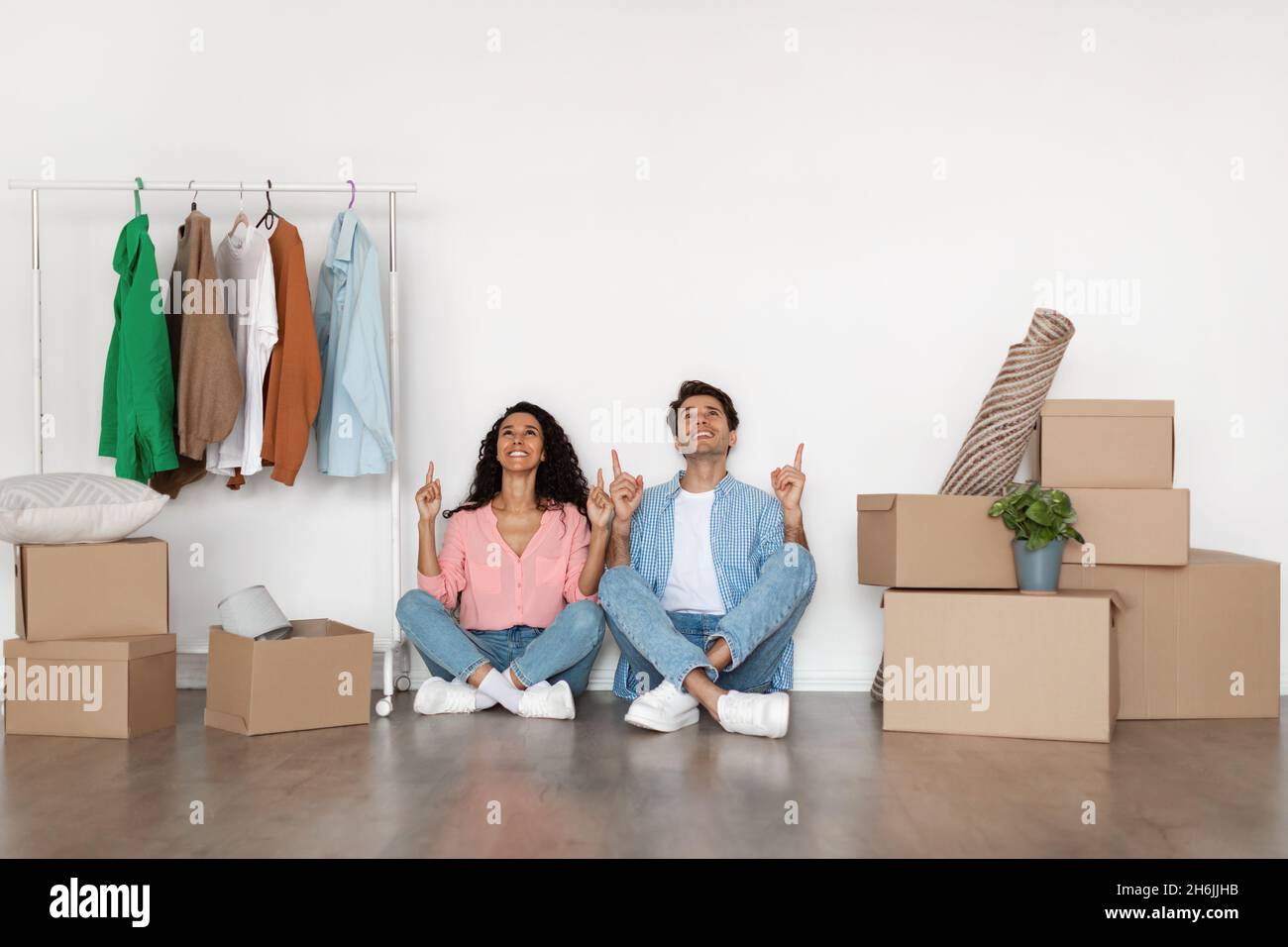 Woman pointing man to door hi-res stock photography and images - Alamy
