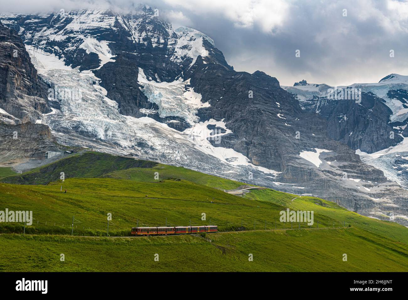 The Jungfrau railway below the Eiger North Face, Kleine Scheidegg, Bernese Oberland, Switzerland, Europe Stock Photo
