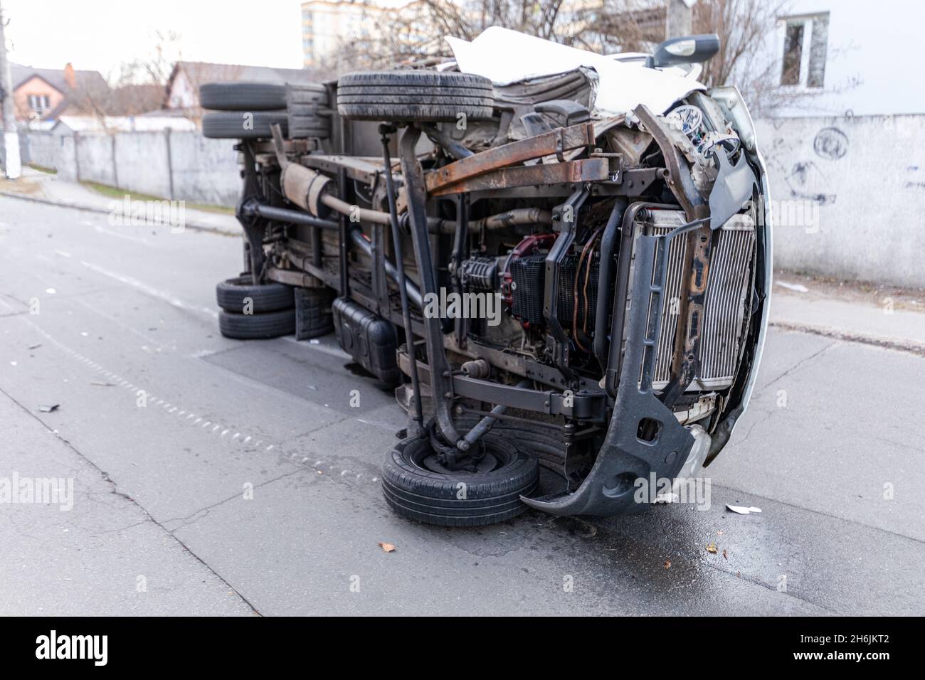 The truck is turned on its side and is lying on the street. Accident. Stock Photo