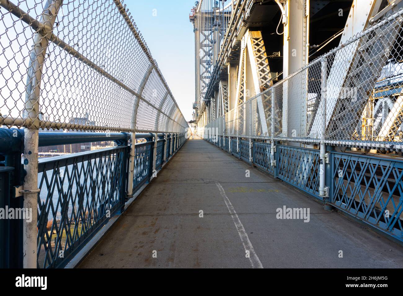 Empty Manhattan Bridge walkway in New York City, suspension bridge