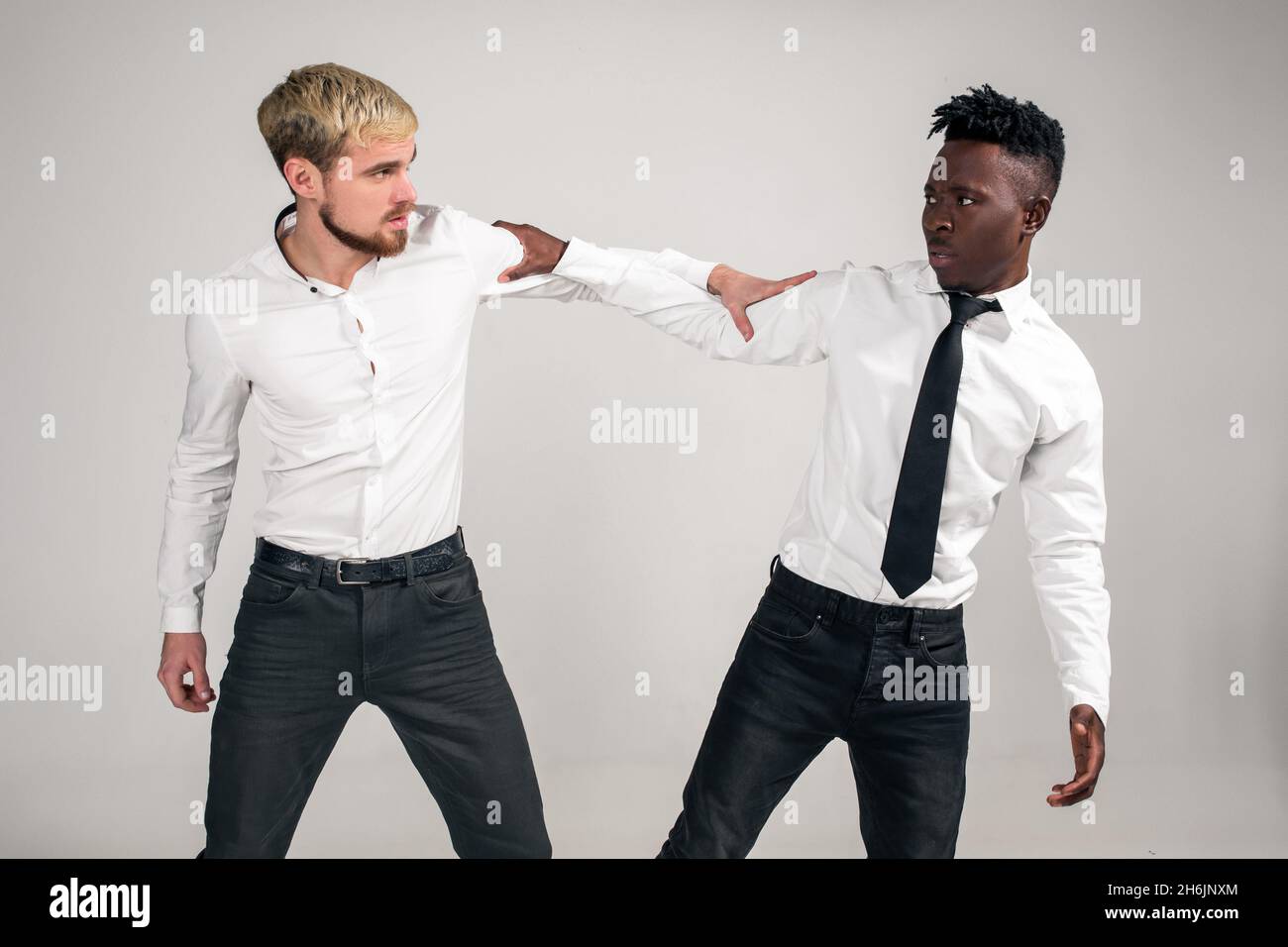 Two stylish men posing hi-res stock photography and images - Alamy
