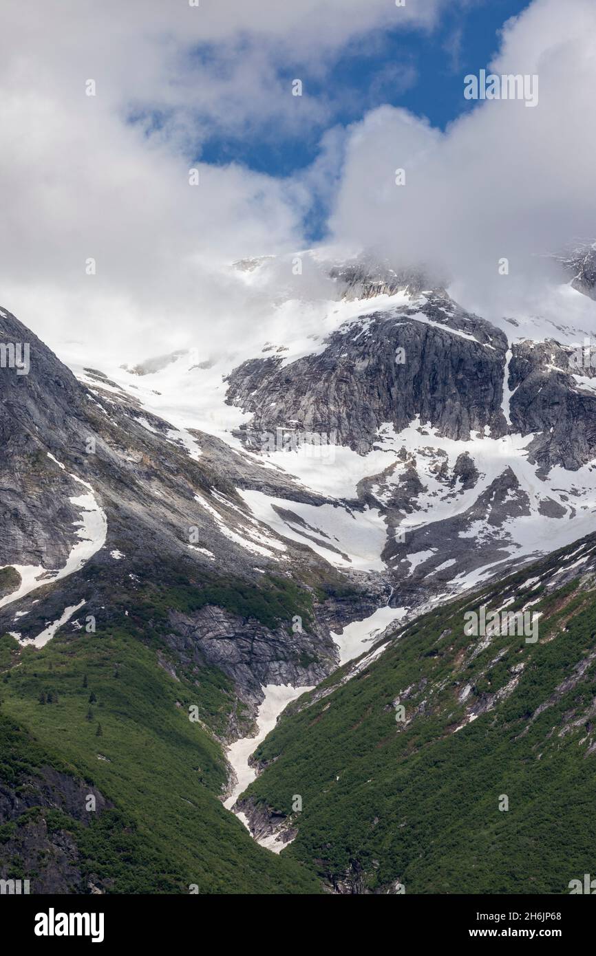 Snow covered mountains and classic U shaped valleys, Tracy Arm, Southeast Alaska, United States of America, North America Stock Photo