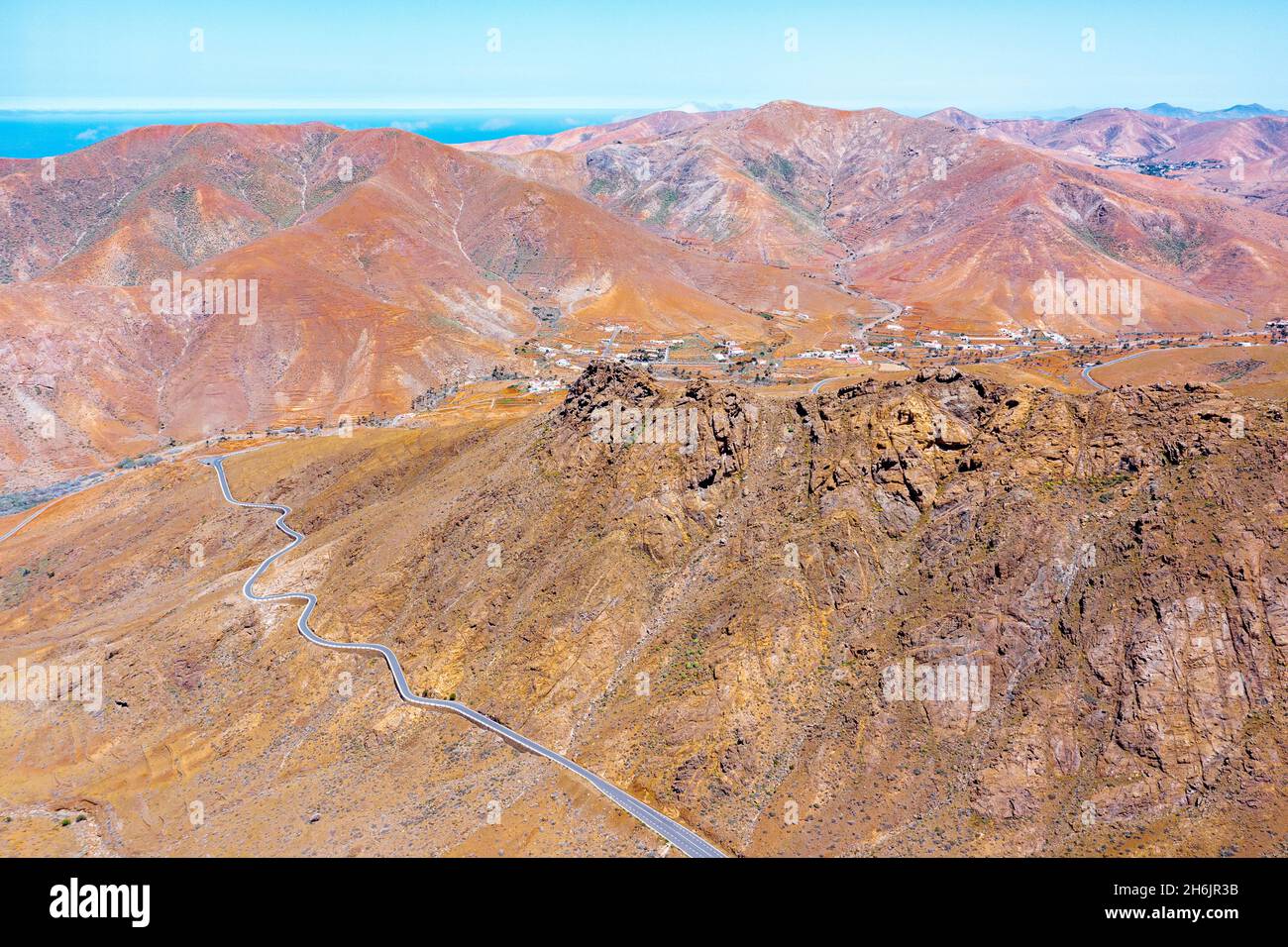 Aerial view of desert road in the barren landscape, Mirador del Risco de las Penas, Pajara Aerial view of desert road in the barren landscape, Mirador del Risco de las Penas, Pajara