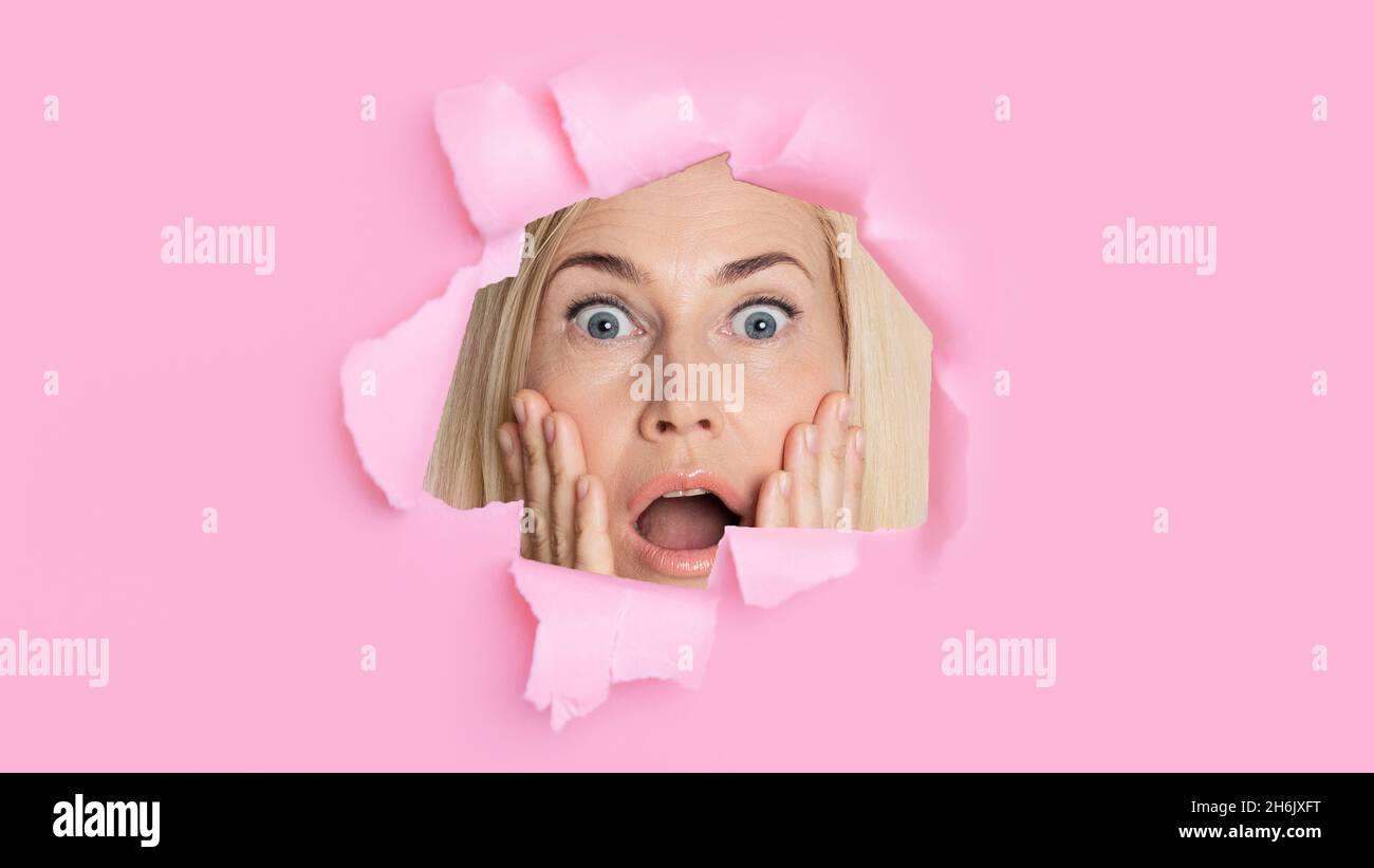 Mature blonde woman surprised expression hi-res stock photography and ...
