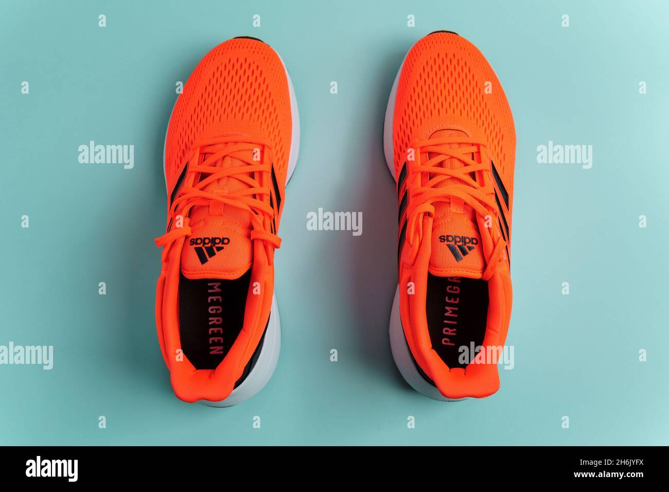 Tyumen, Russia-November 13, 2021: Adidas Running Shoes. Adidas logo  multinational company Stock Photo - Alamy