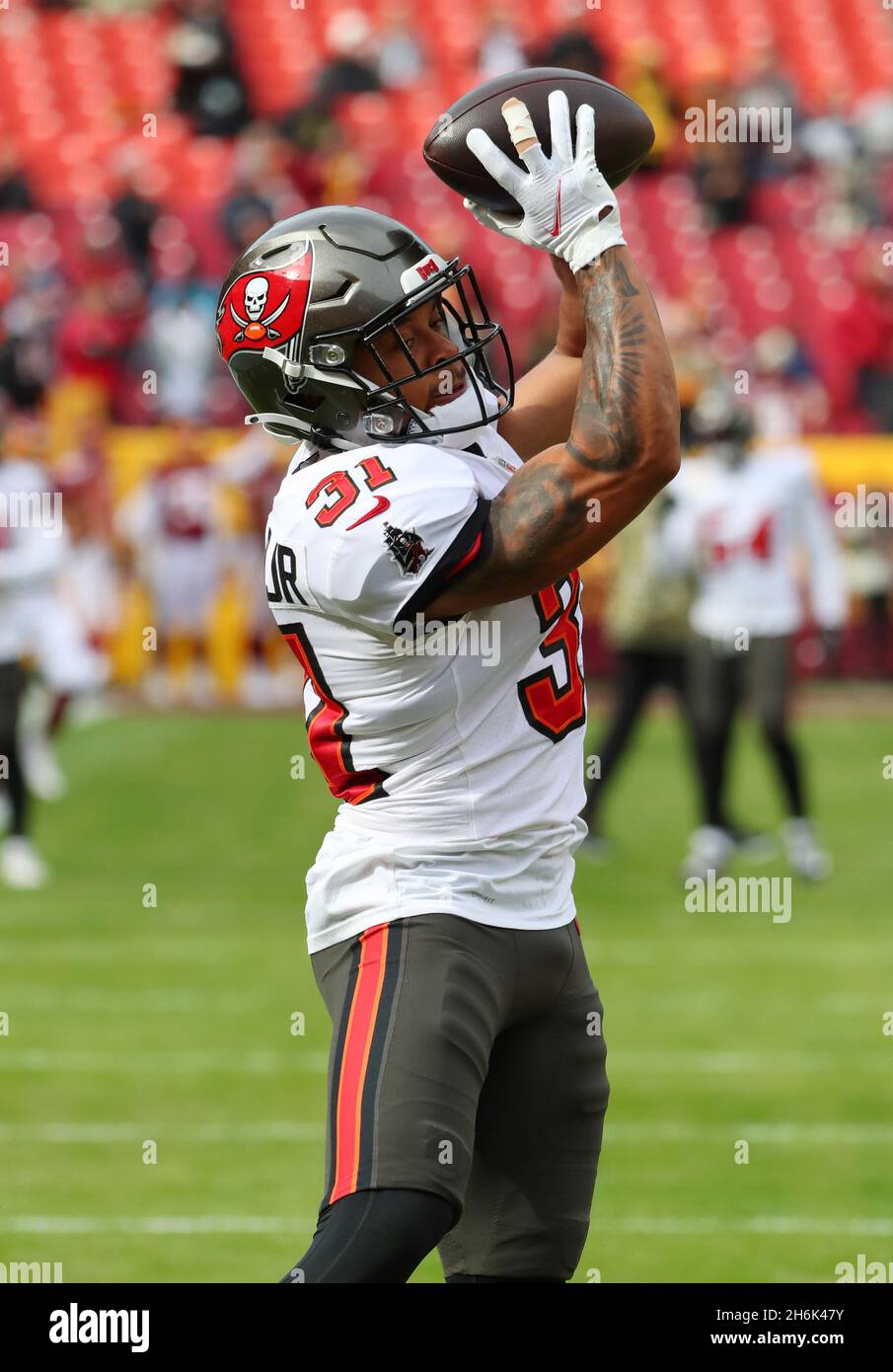 Nov 14, 2021; Landover, MD USA; Tampa Bay Buccaneers center Ryan Jensen  (66) prepares before an NFL game at FedEx Field. The Washington Football  Team beat the Buccaneers 29-19. (Steve Jacobson/Image of