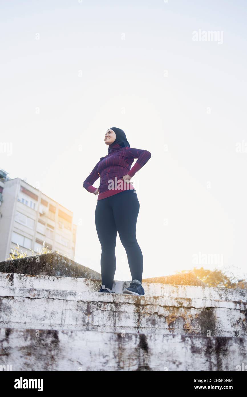 Teenage Middle Eastern woman standing proudly Stock Photo