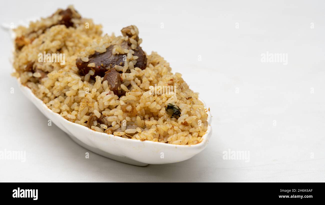 Close up Yummy delicious beef biryani in a white bowl. Sri Lankan traditional Style. Stock Photo