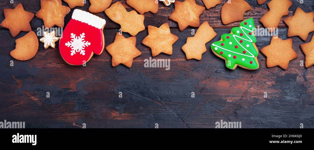 Christmas greeting card with gingerbread on old wooden vintage ...