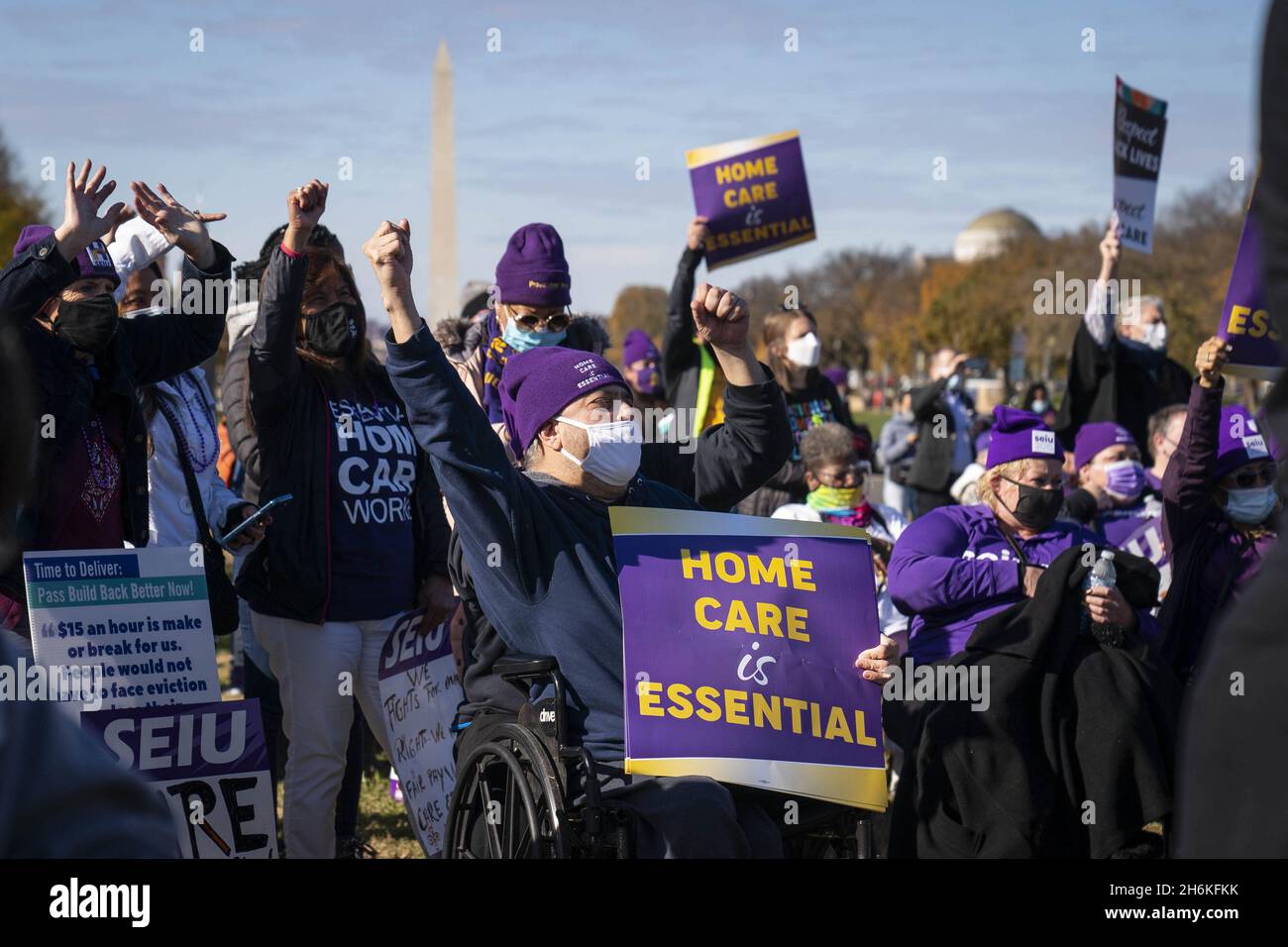 Washington, United States. 16th Nov, 2021. People shout in support during a rally in support of the care economy investments in the Build Back Better agenda hosted by the National Domestic Workers Alliance, MomsRising, and the Service Employees International Union (SEIU) on the National Mall in Washington DC on Tuesday, November 16, 2021. Photo by Sarah Silbiger/UPI Credit: UPI/Alamy Live News Stock Photo
