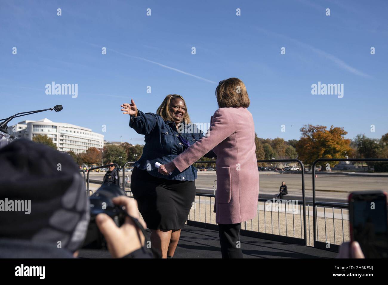 Washington, United States. 16th Nov, 2021. April Verrett, president of Service Employees International Union Local 2015, greets Speaker of the House Nancy Pelosi, D-CA, during a rally in support of the care economy investments in the Build Back Better agenda hosted by the National Domestic Workers Alliance, MomsRising, and the SEIU on the National Mall in Washington DC on Tuesday, November 16, 2021. Photo by Sarah Silbiger/UPI Credit: UPI/Alamy Live News Stock Photo