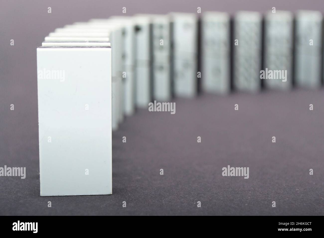 Domino effect falling row symbol hi-res stock photography and images ...