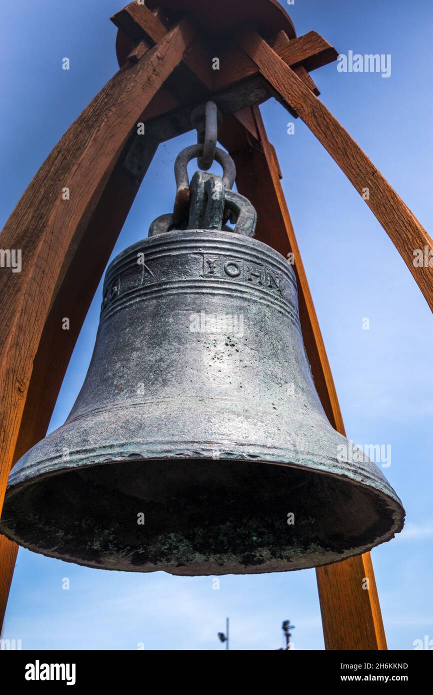 Old shipyard bell was cast by John Darby, now located at the Navyard formally the old naval shipyard at Harwich Essex England Stock Photo