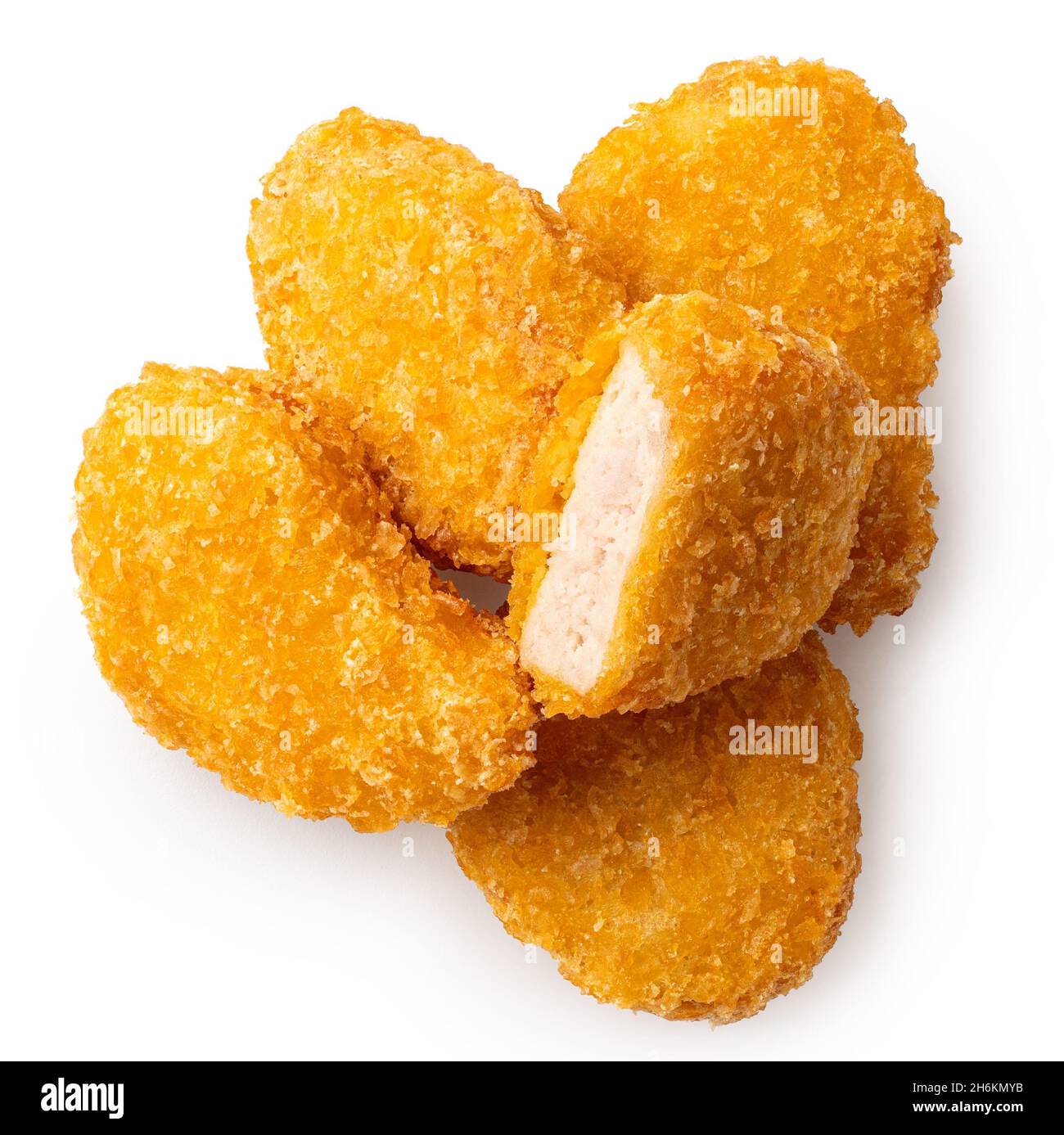 Pile of fried gluten free cornflake crumb chicken nuggets isolated on white. One cut. Top view. Stock Photo