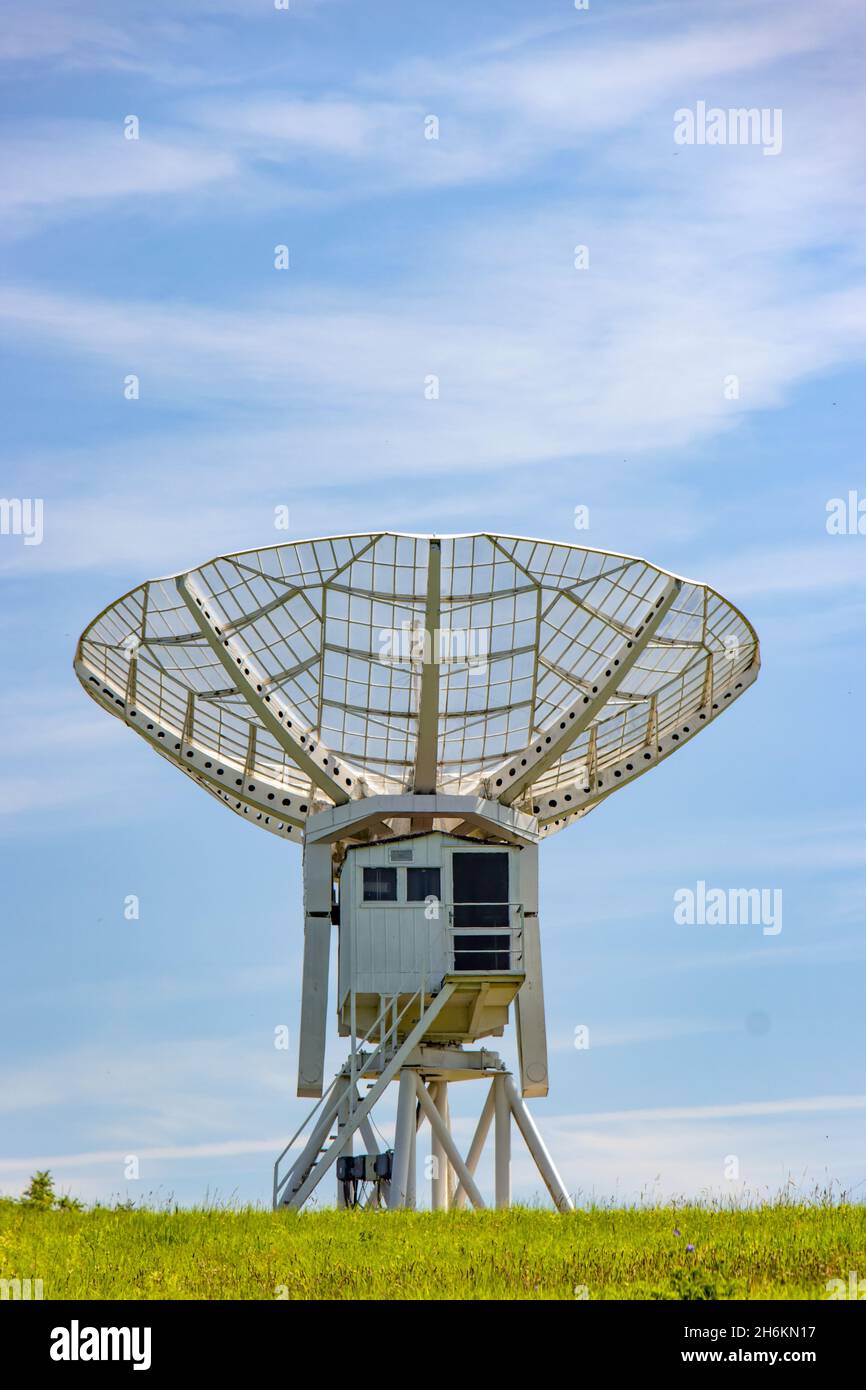 Ionospheric observatory with a giant satellite dish for receiving a satellite signal. Stock Photo