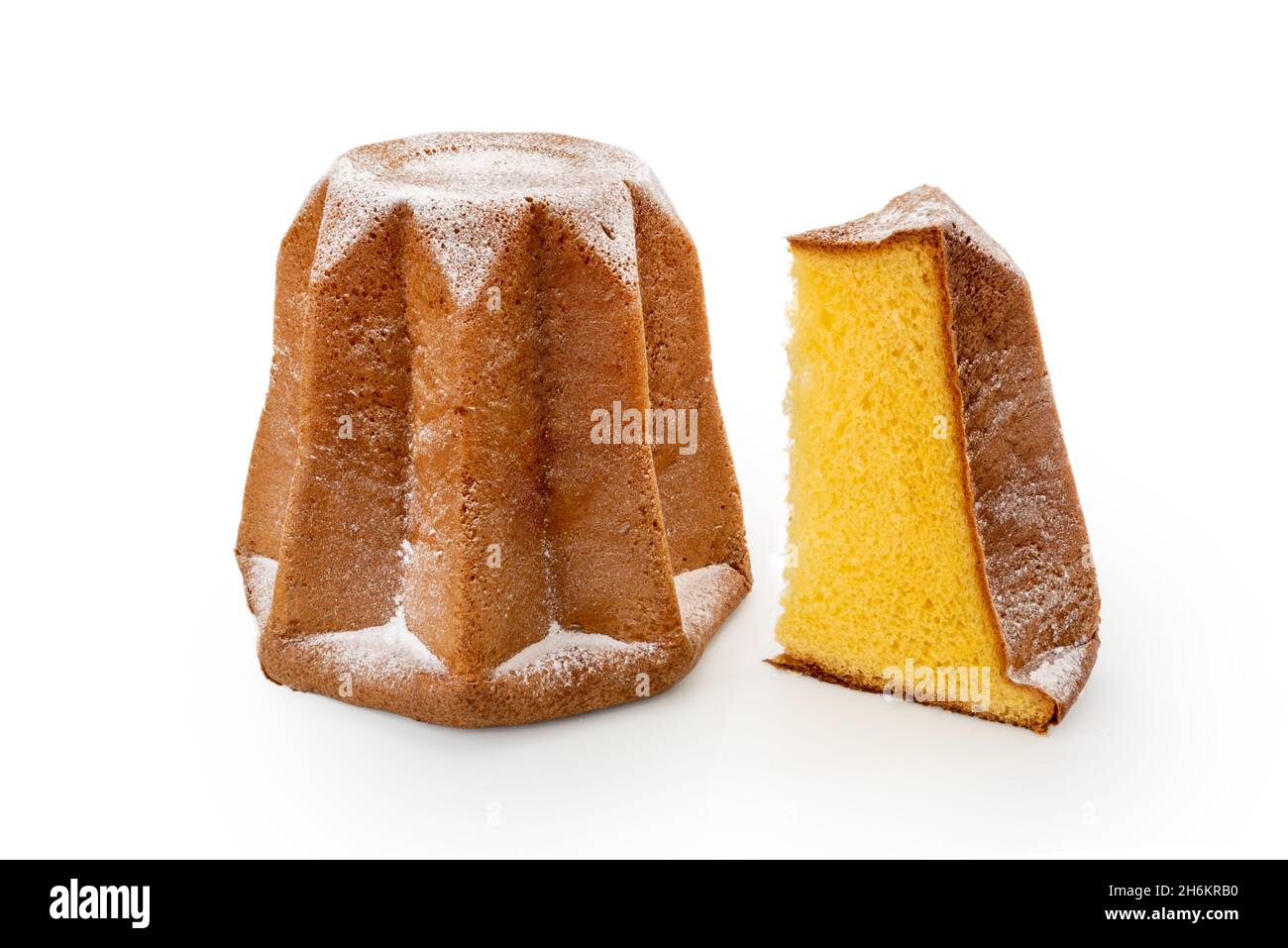 Pandoro with slice, traditional Italian Christmas cake from Verona with icing sugar isolated on white Stock Photo
