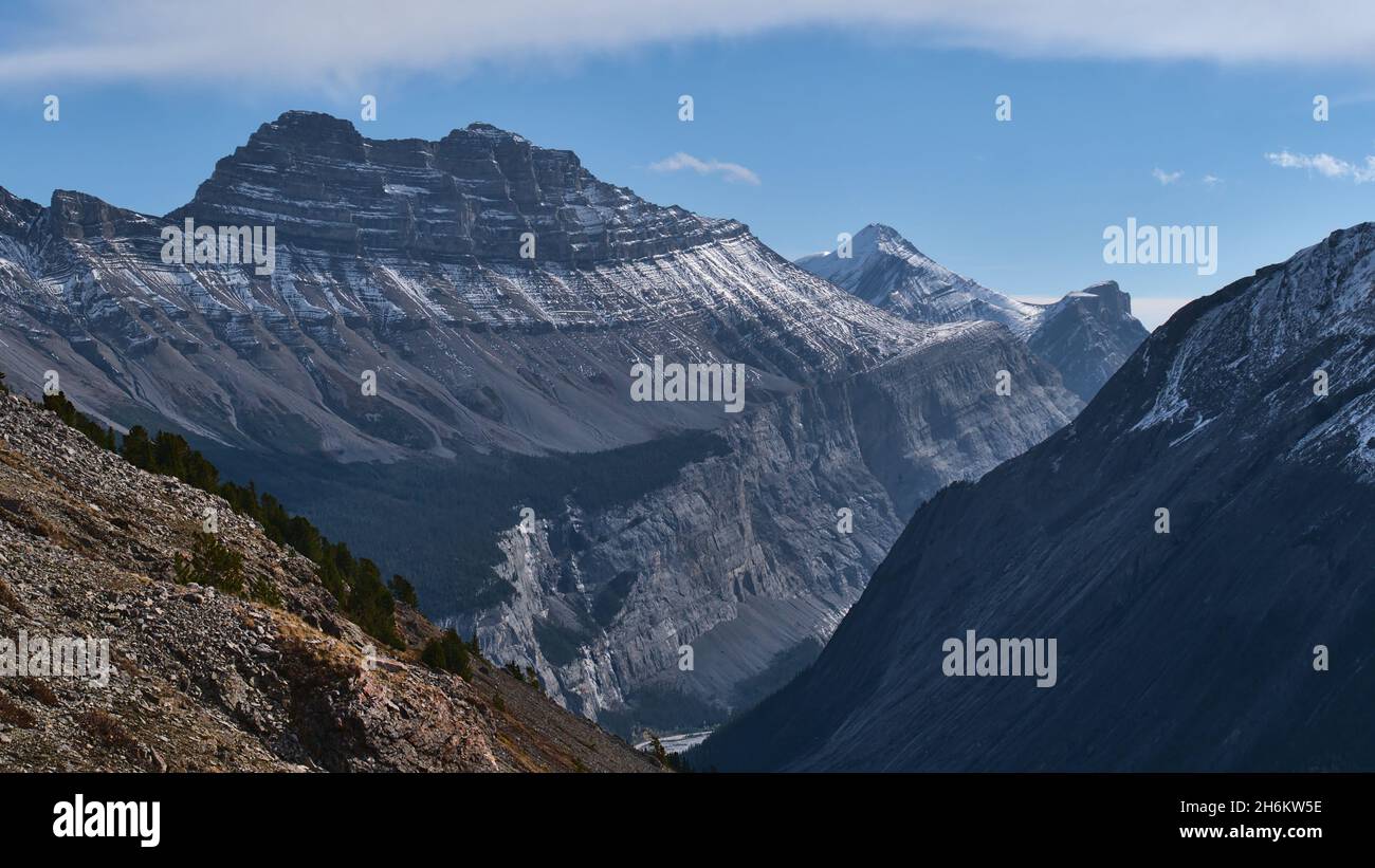 Beautiful view of snow-capped Cirrus Mountain with majestick rock face above North Saskatchewan River Valley in Banff National Park, Alberta, Canada. Stock Photo