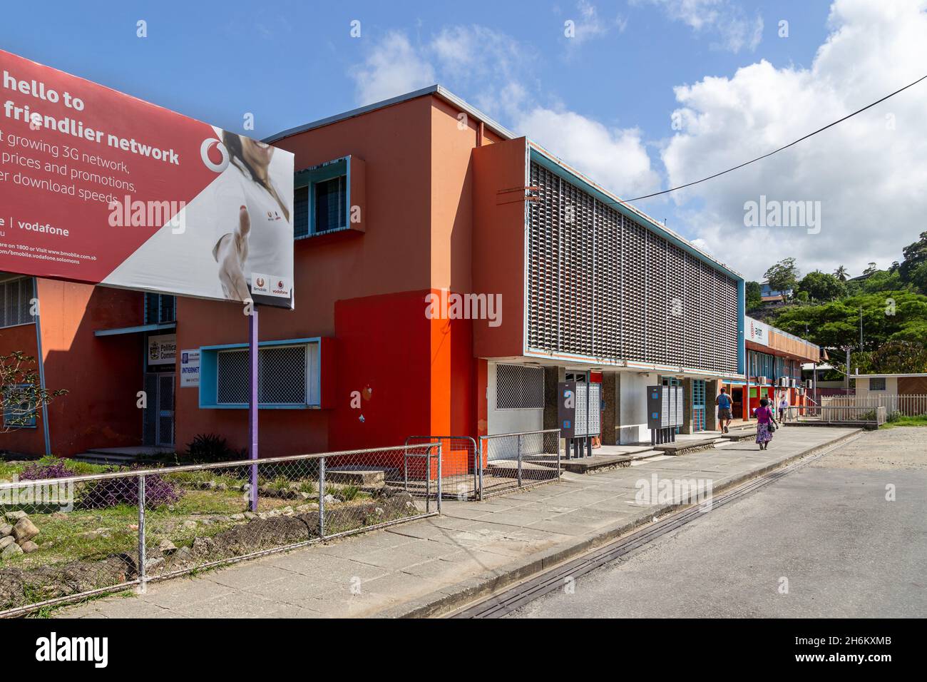 HONIARA, SOLOMON ISLANDS - Jan 11, 2016: People in front of the main entry doors of Honiara General Post Office in Honiara, the capital city of the So Stock Photo