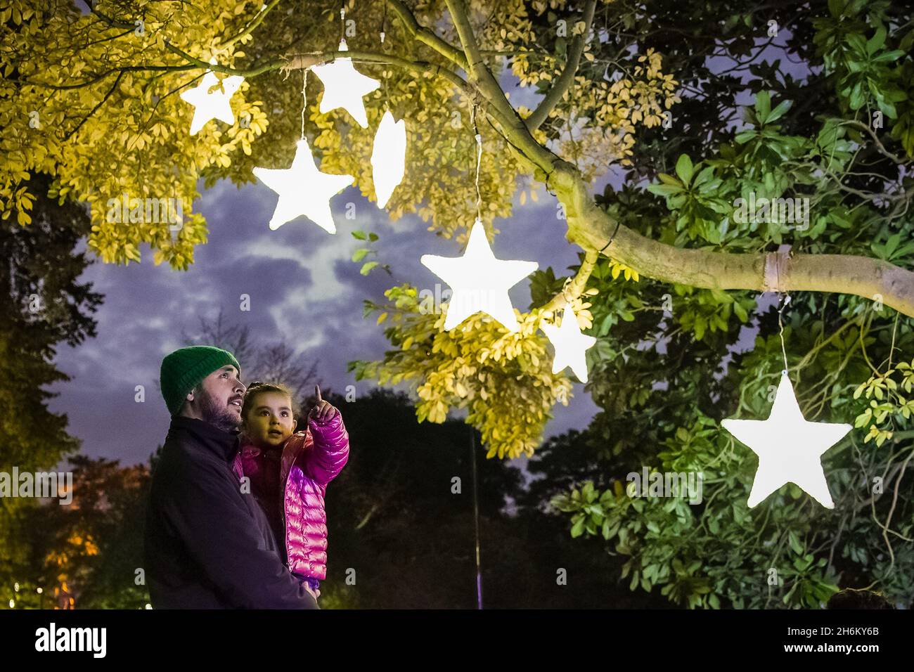 London, UK. 16th Nov 2021. Christmas at Kew winter lights trail. Now in itÕs ninth year, Christmas at Kew sees immersive lighting trails, installations and interactive multi-sensory illumination bring the garden landscape to life after dark. Credit: Guy Corbishley/Alamy Live News Stock Photo