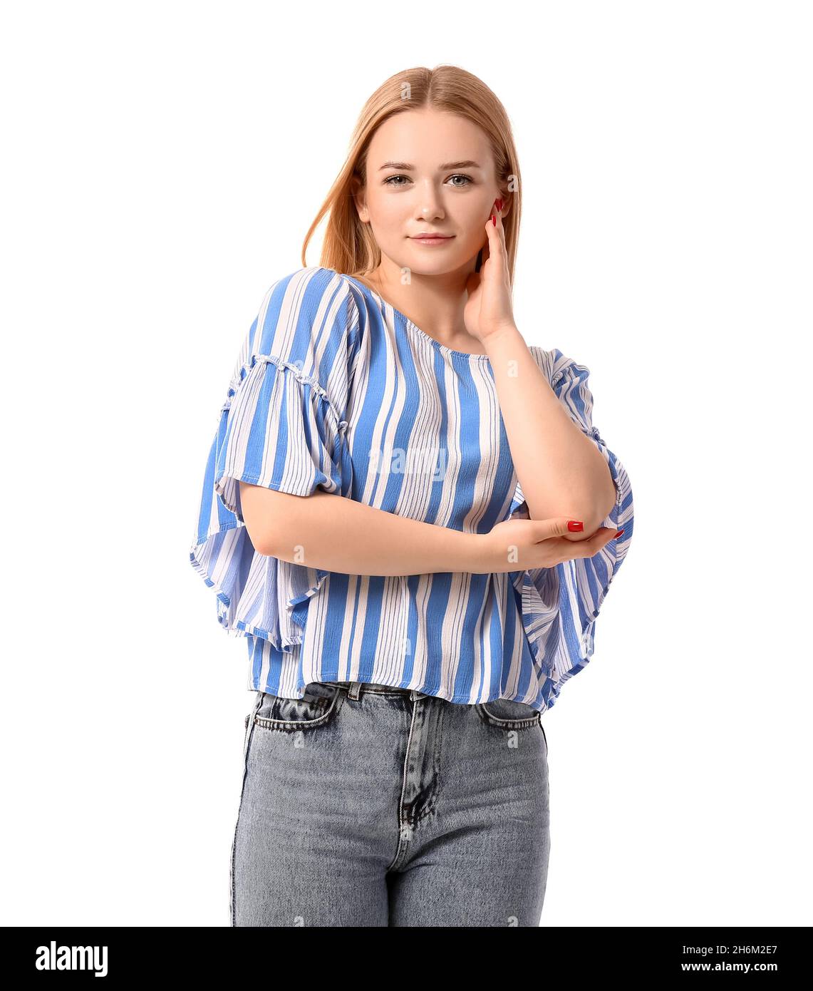 Young blonde woman in striped blouse on white background Stock Photo ...