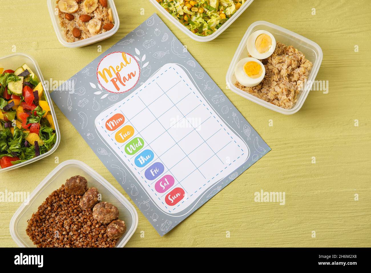 Food Container Plan Containers with different healthy food and meal plan on color wooden ...