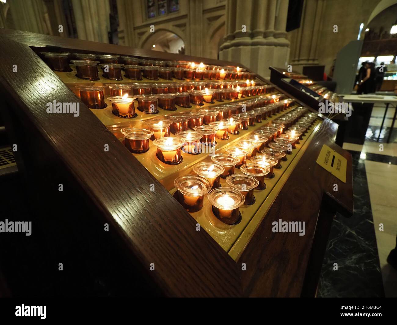 Numerous votive candles in the St. Patrick's Cathedral in New York City
