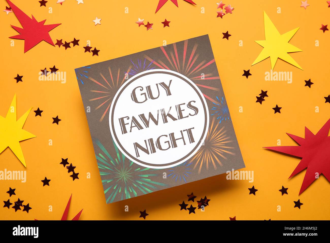 Greeting card for Guy Fawkes night and confetti on orange background ...