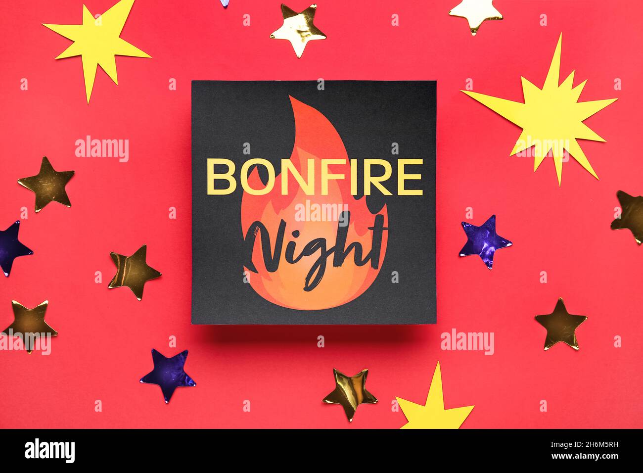 Greeting card for Guy Fawkes night and confetti on red background Stock ...