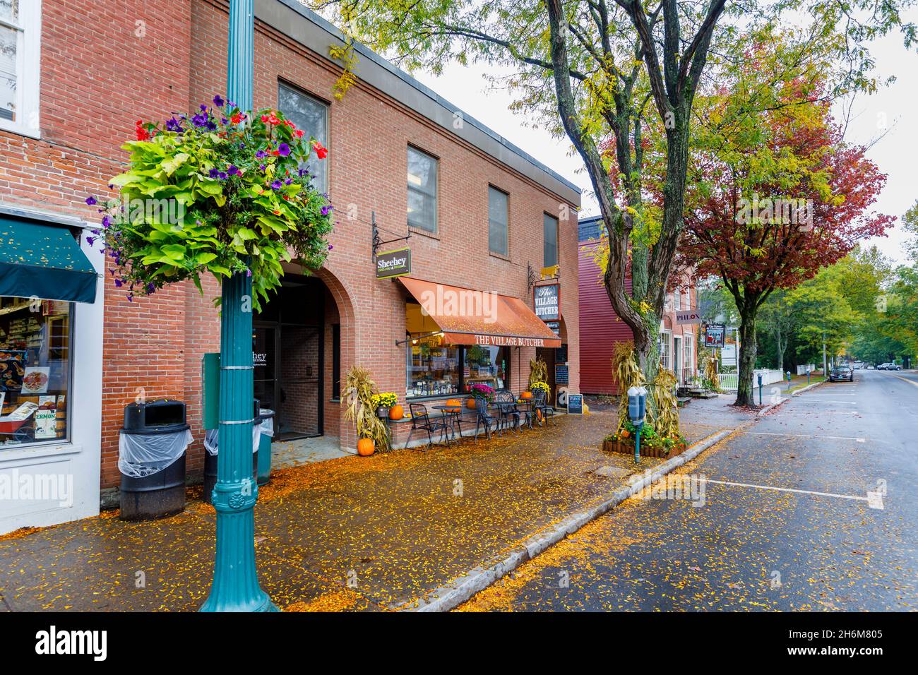 Brown awning above the shopfront of local deli 'The Village Butcher' in Woodstock, Vermont, New England, USA Stock Photo